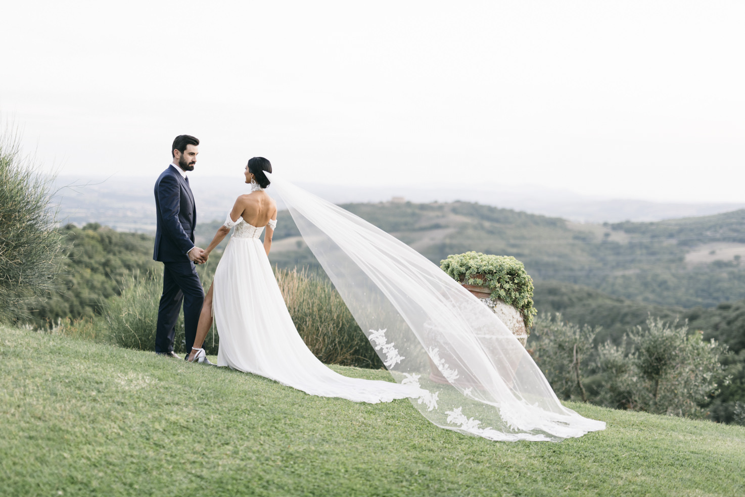 Bride and groom in the gardens of Vicarello castle