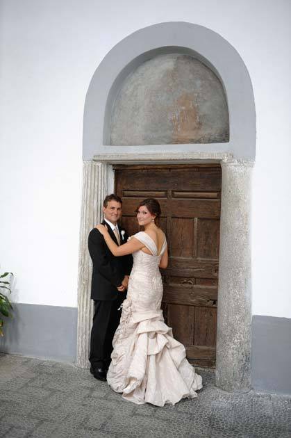 Bridal couple in front of the Church of St Anthony in Amalfi