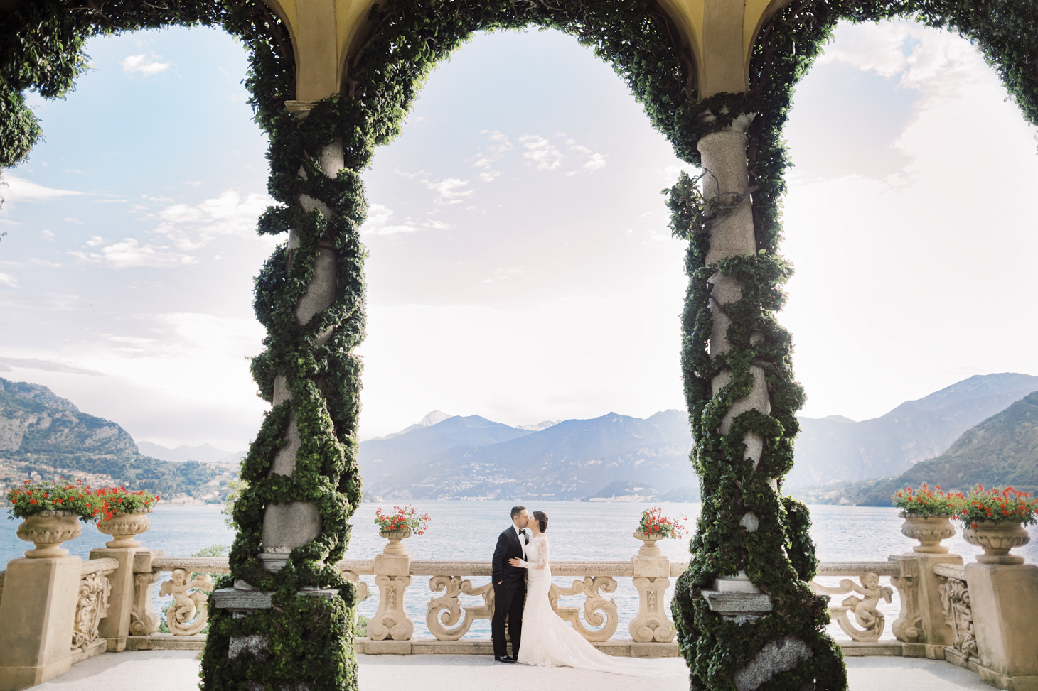 Bridal couple under the arches of Villa del Balbianello