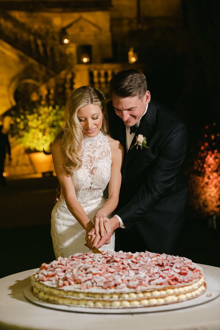 Newlyweds cutting the wedding cake
