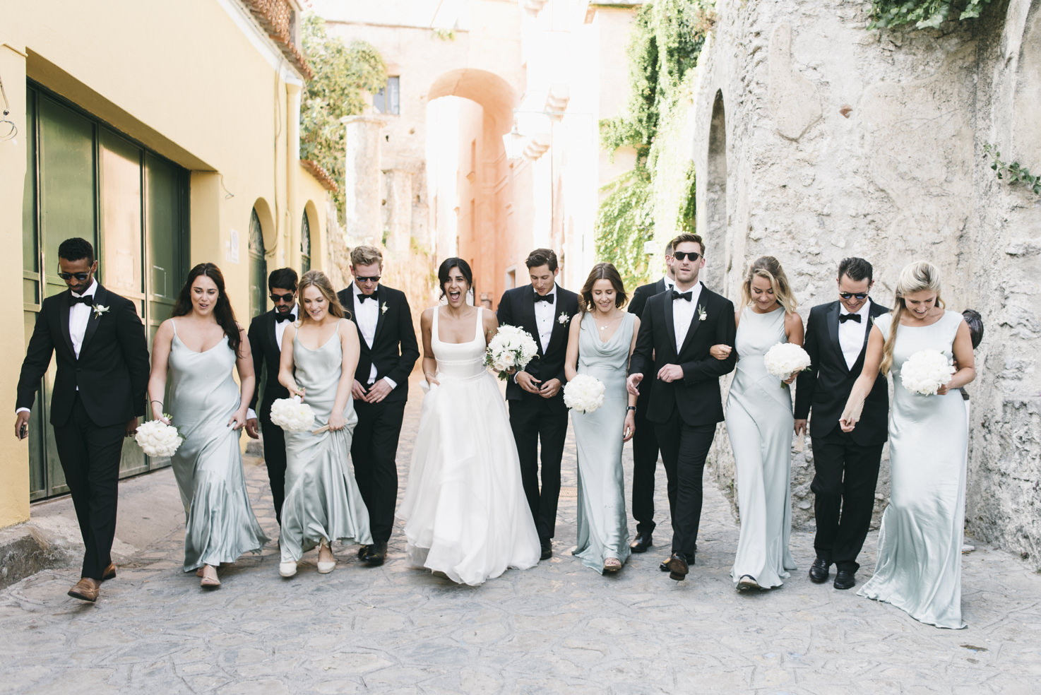Bridal couple and guests in the streets of Ravello