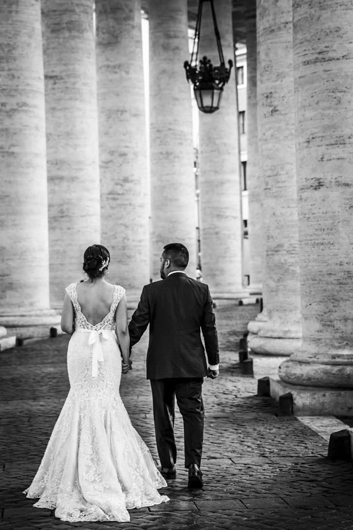 Bride and groom at St. Peter's colonnade