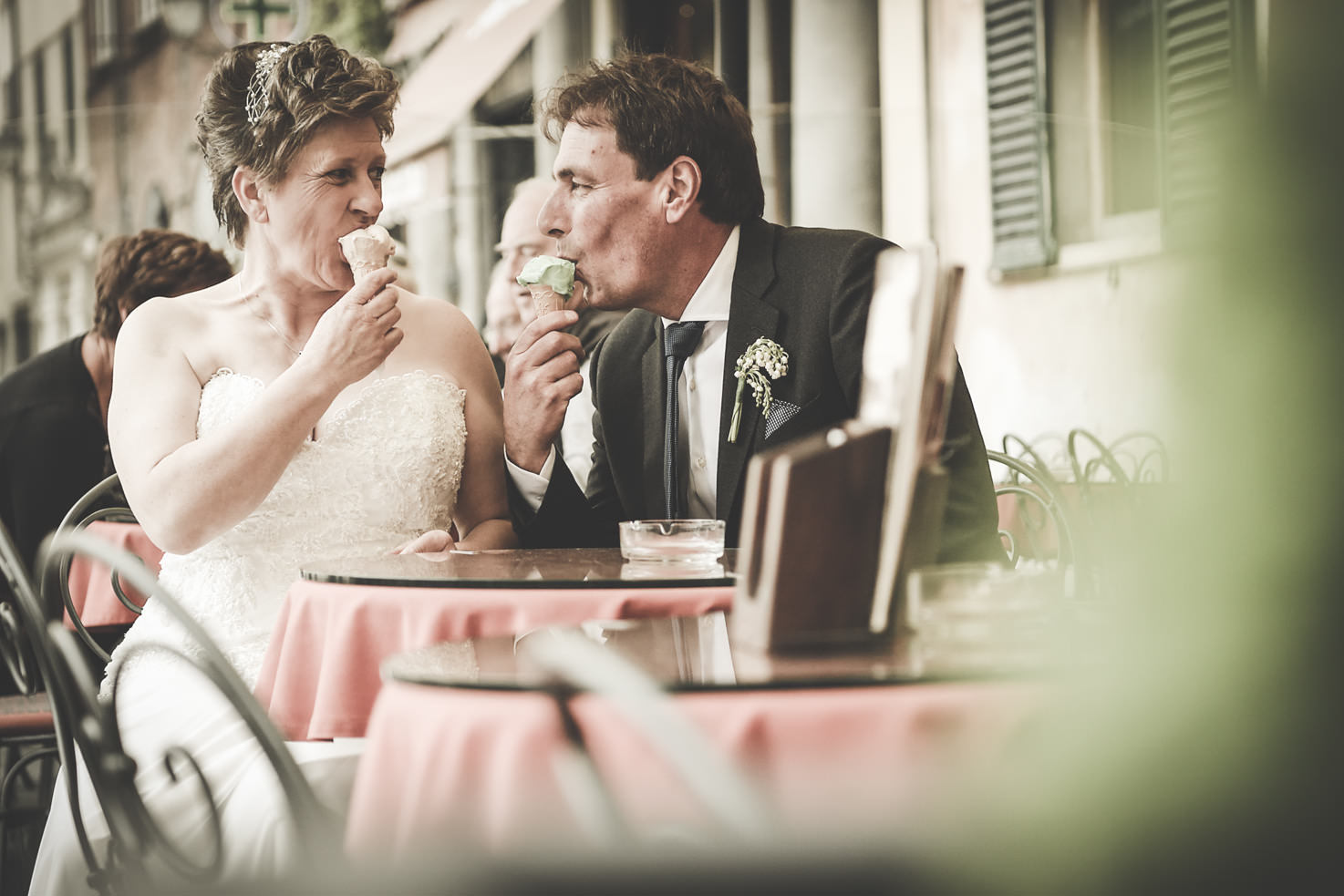 Bridal couple enjoying Italian gelato
