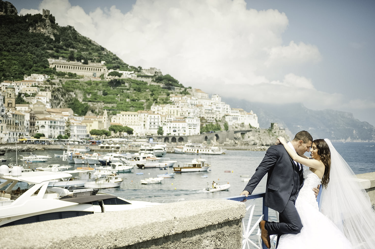 Bridal couple with panorama of Amalfi