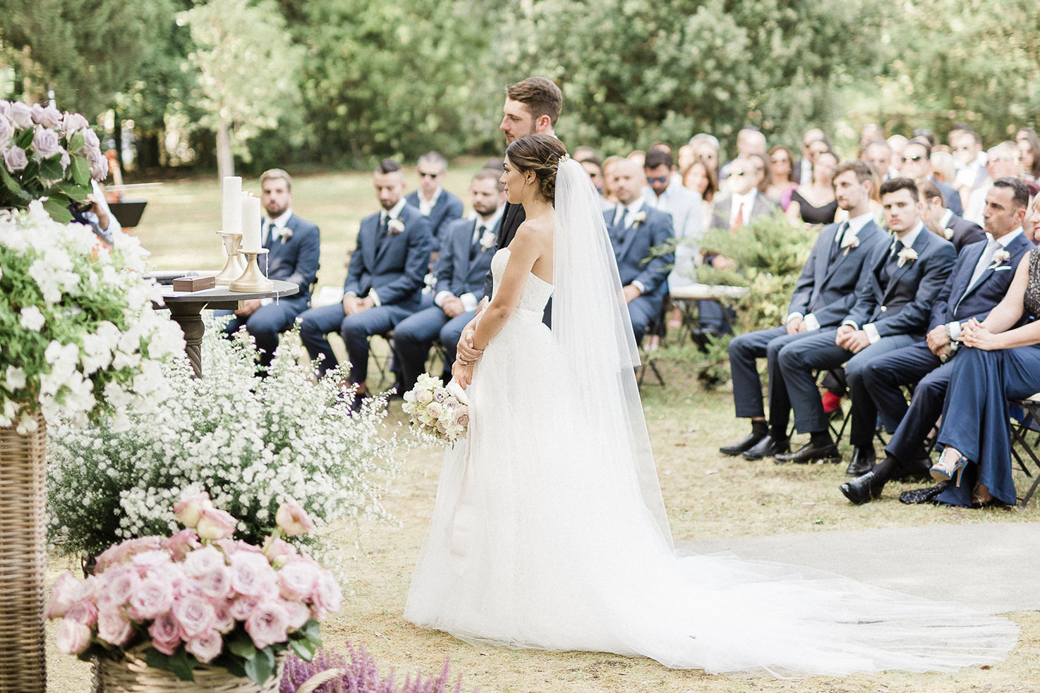Outdoor wedding ceremony in a garden in Tuscany