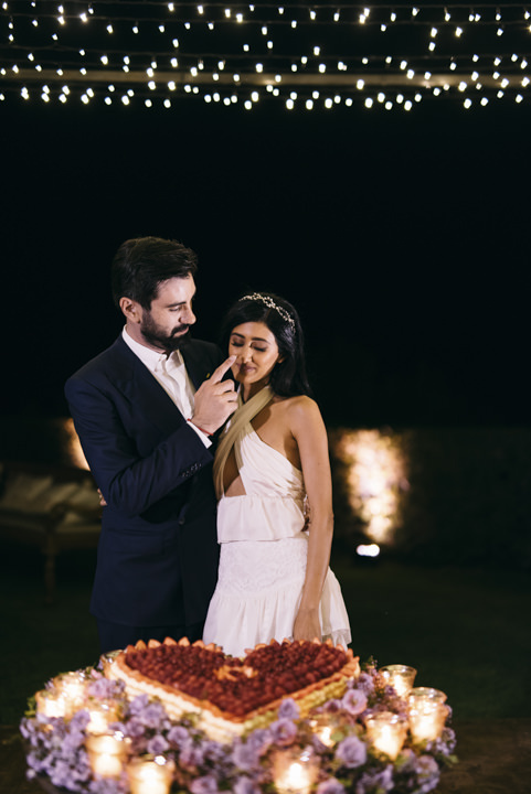 Cutting of the cake at Italian wedding banquet