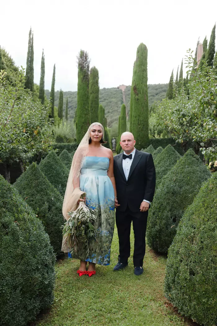 Bride and groom portrayed at Villa Cetinale