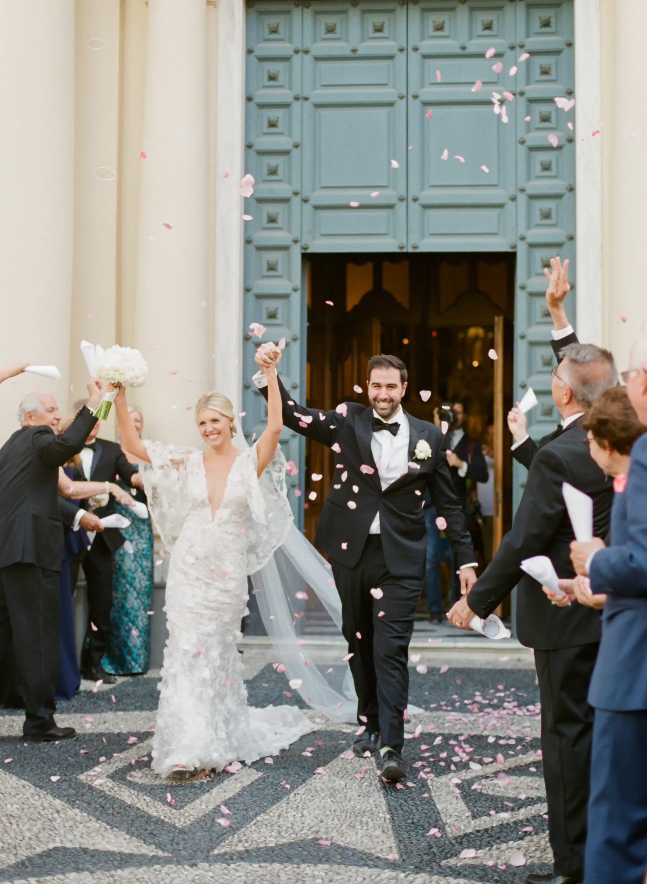 Tossing petals to the newlyweds