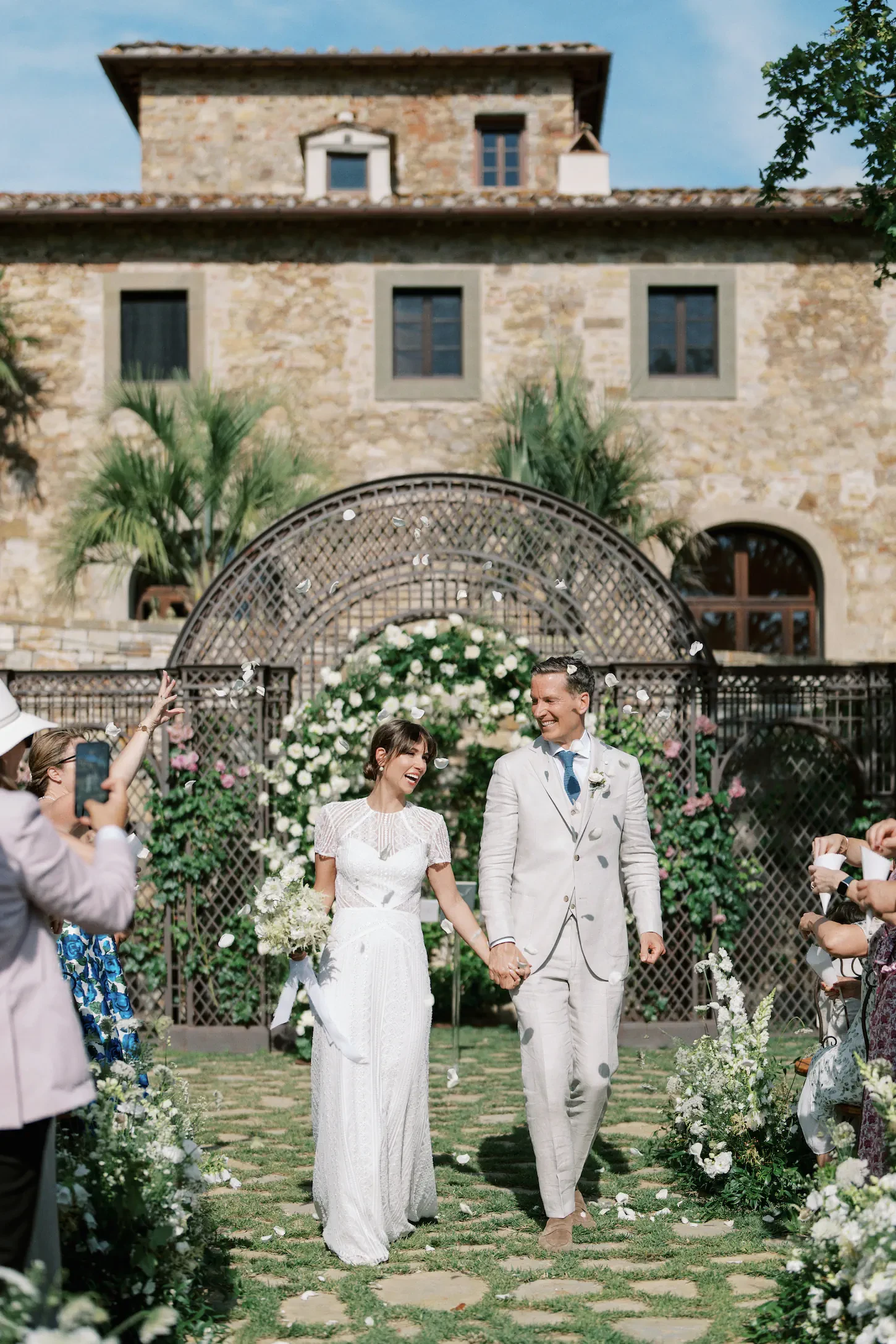 Bride and Groom Petal Toss Tuscany Wedding