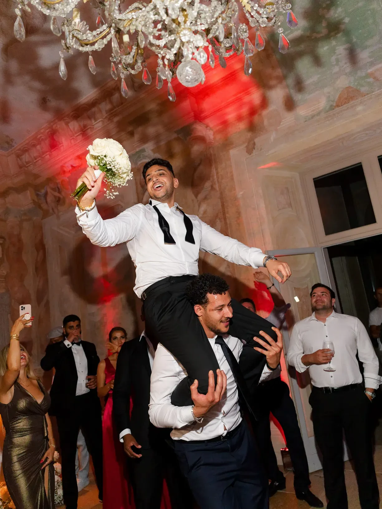 Groom celebrating with guests