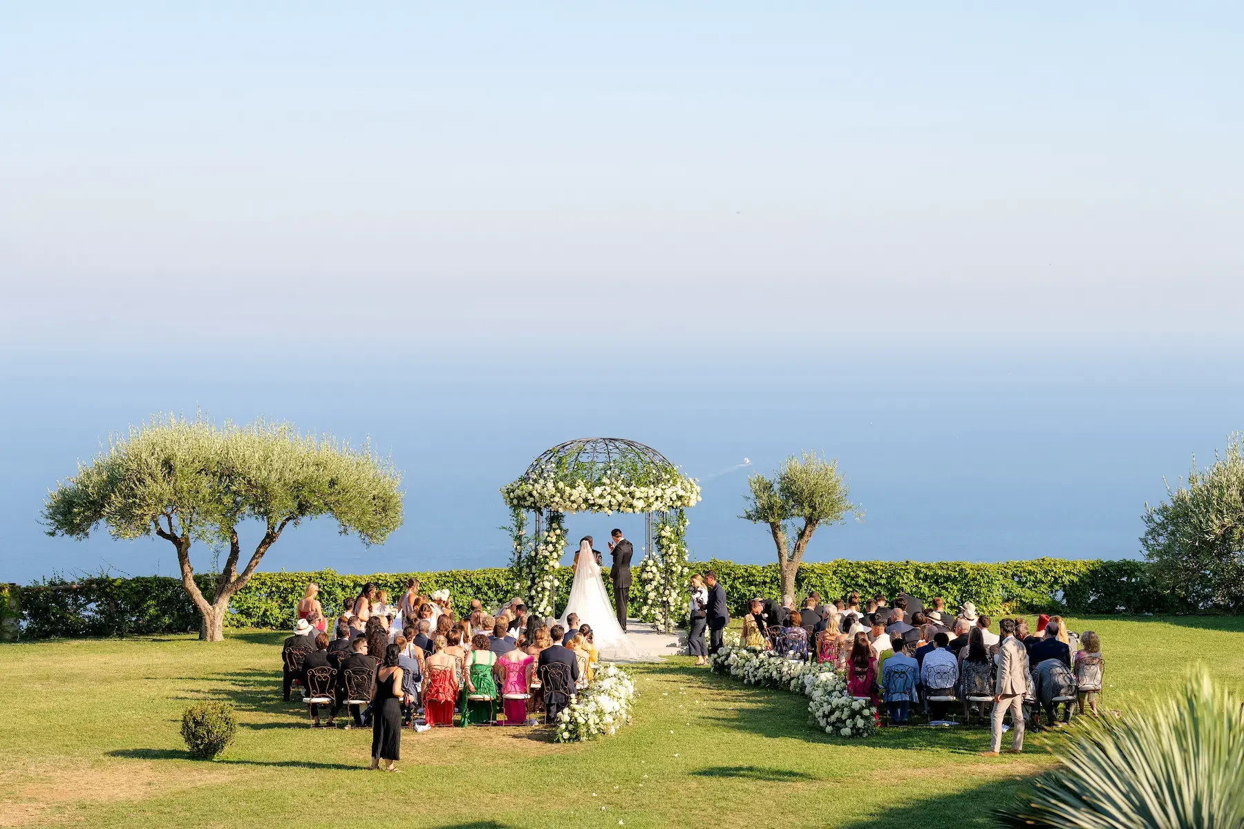 wedding ceremony under the flower dome the gardens of Villa Cimbrone