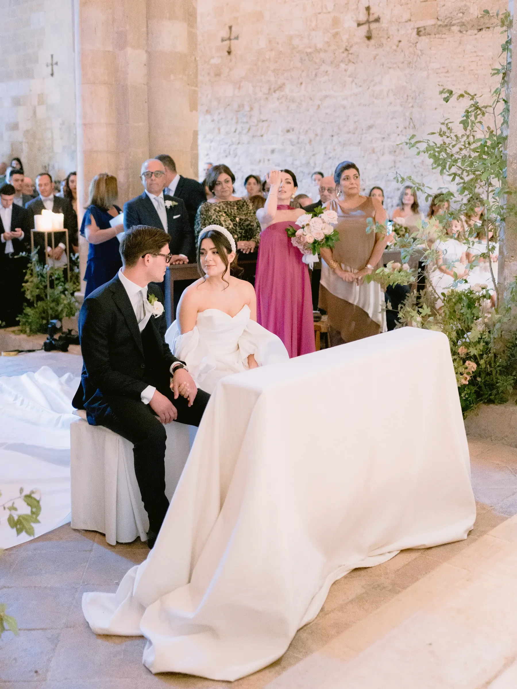 bride and groom preparing for the ceremony in the church