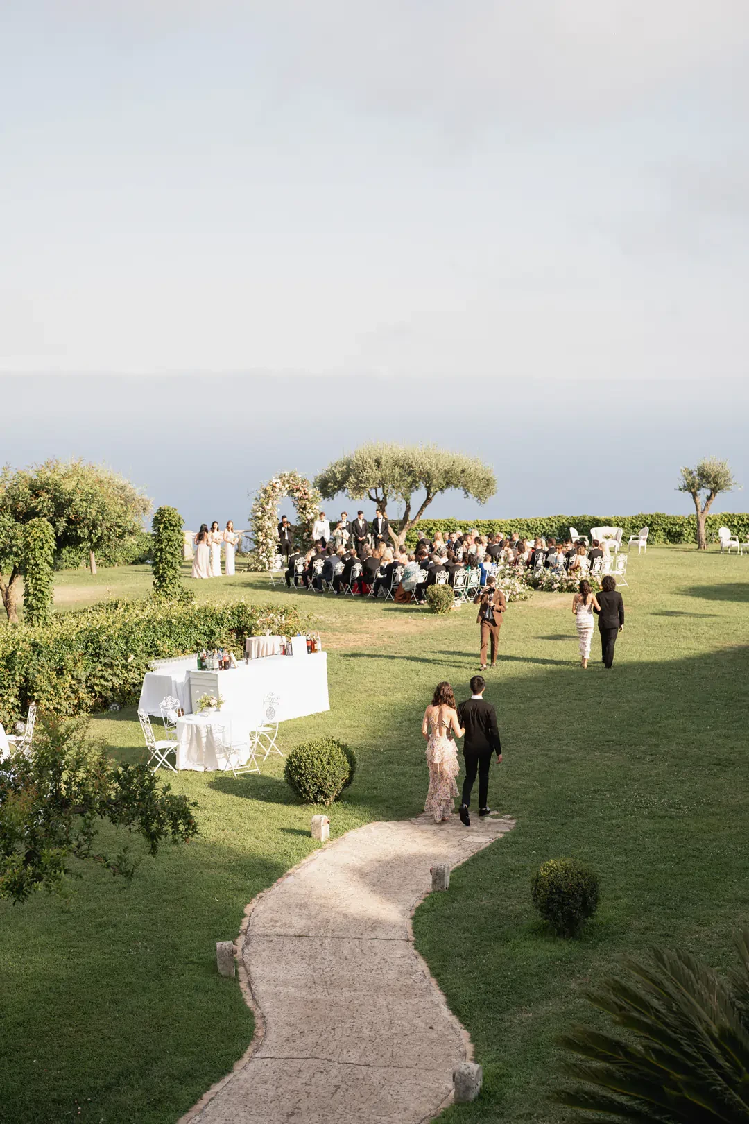 guests arrival at the wedding ceremony in the gardens of Villa Cimbrone in Ravello