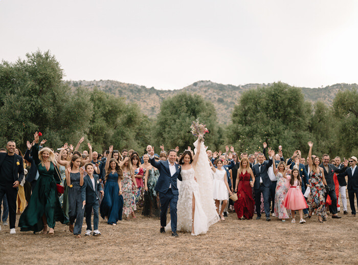 Bride and Groom Celebrating With Wedding Guests Outdoor