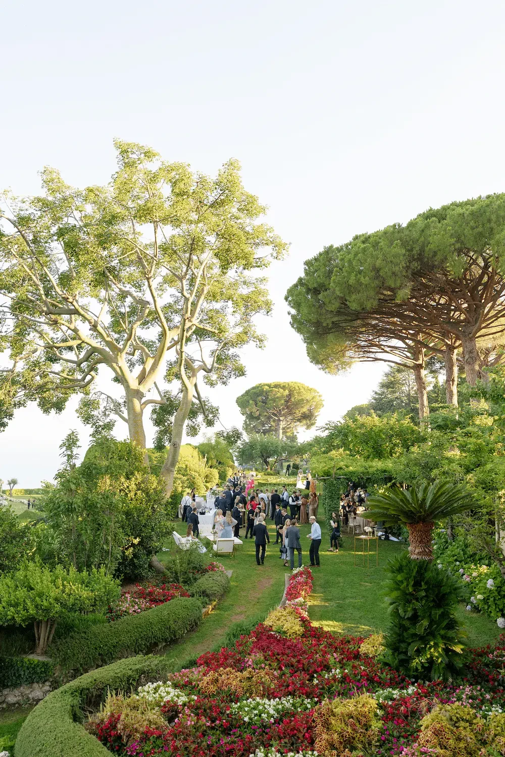 guests in the garden of villa cimbrone during the wedding celebrations
