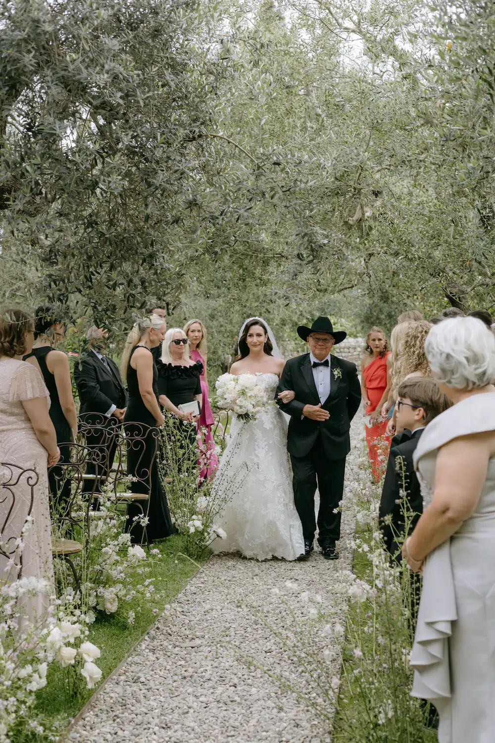 Bride Walking Down The Aisle With Father Outdoor Wedding