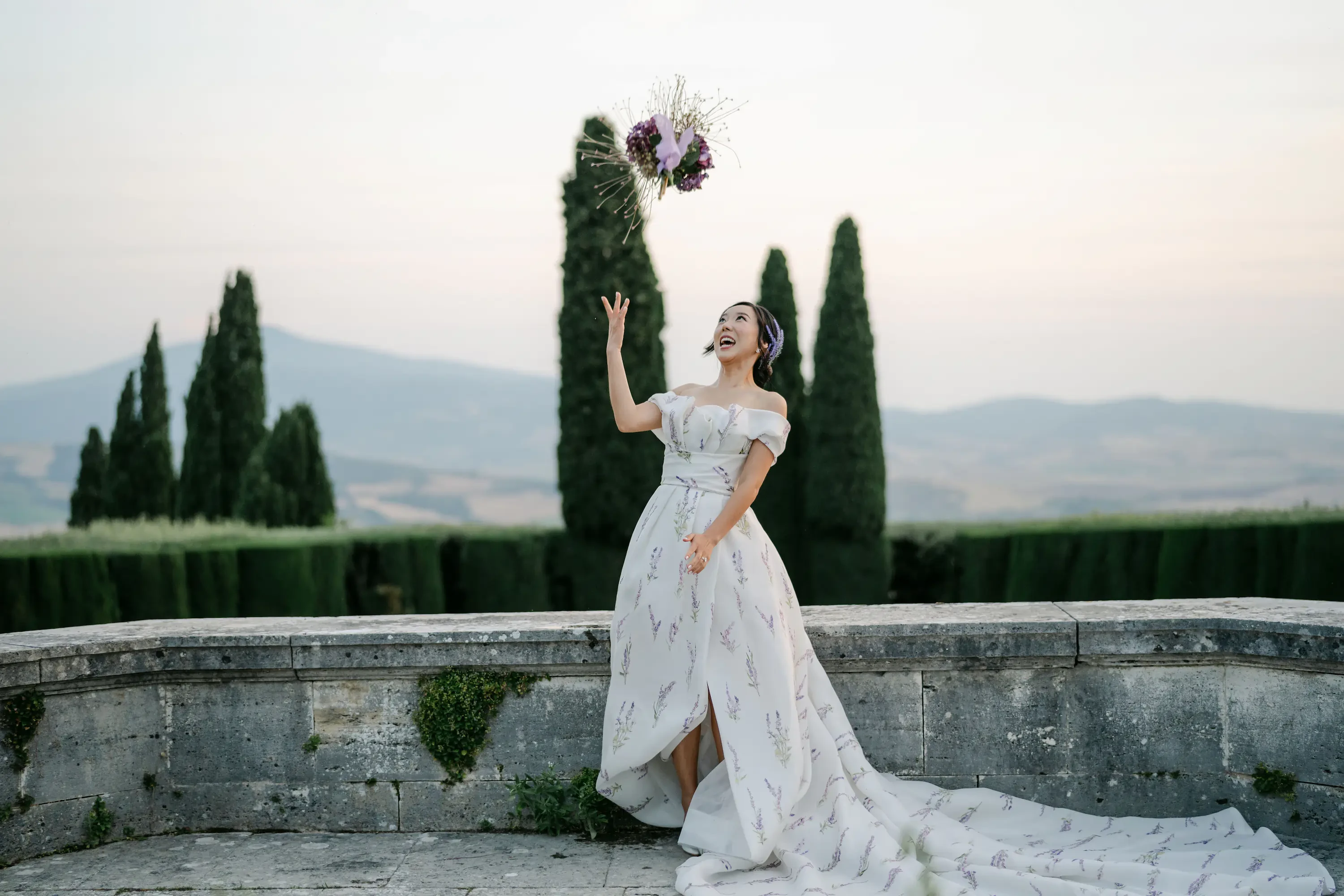 Bride Tossing Bouquet In The Air