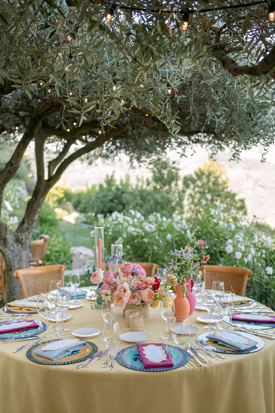 Round table under the olive threes