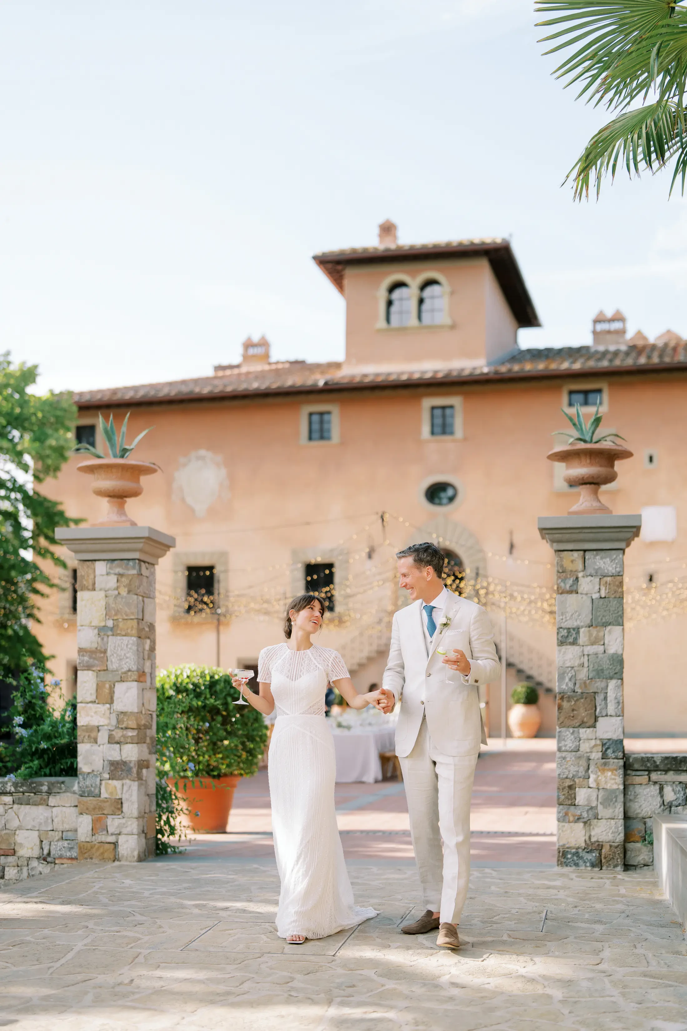 Bride and Groom Cocktail Hour Courtyard Il Borgo Di Vignamaggio