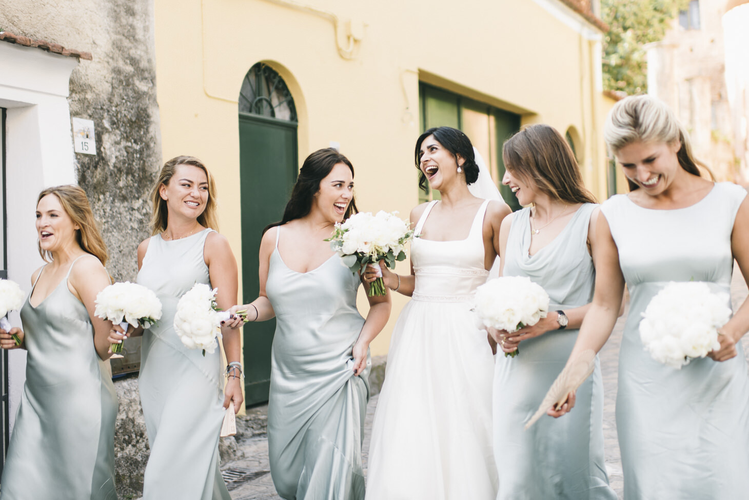 Bride and bridesmaids arriving at the ceremony