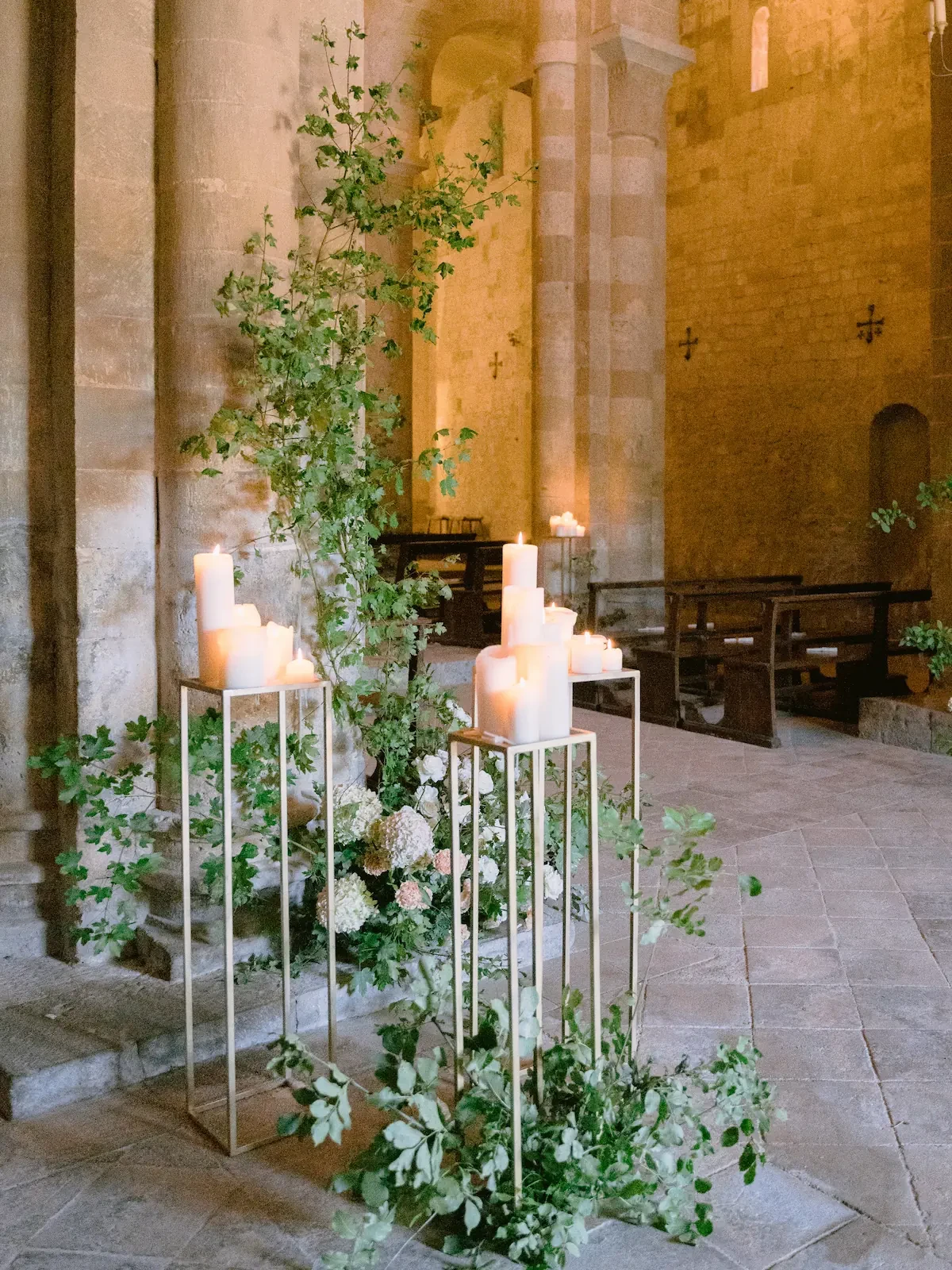floral and candles decorations inside the church in siena