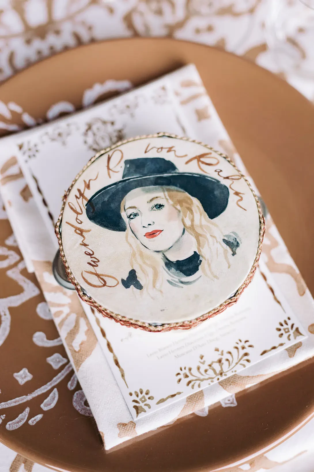 Watercolor tambourines used as place cards
