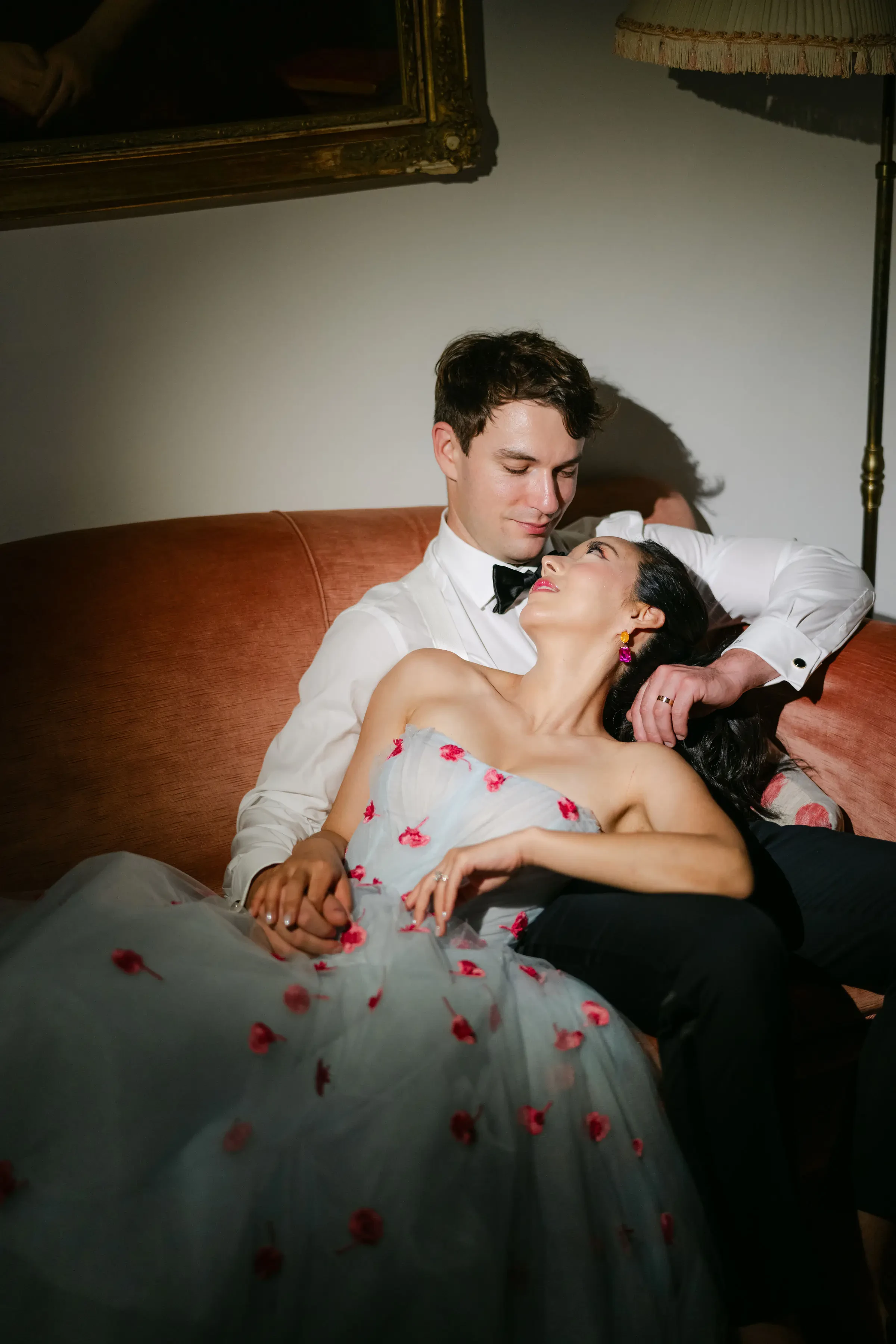 Bride And Groom Cozy Portrait On Vintage Sofa