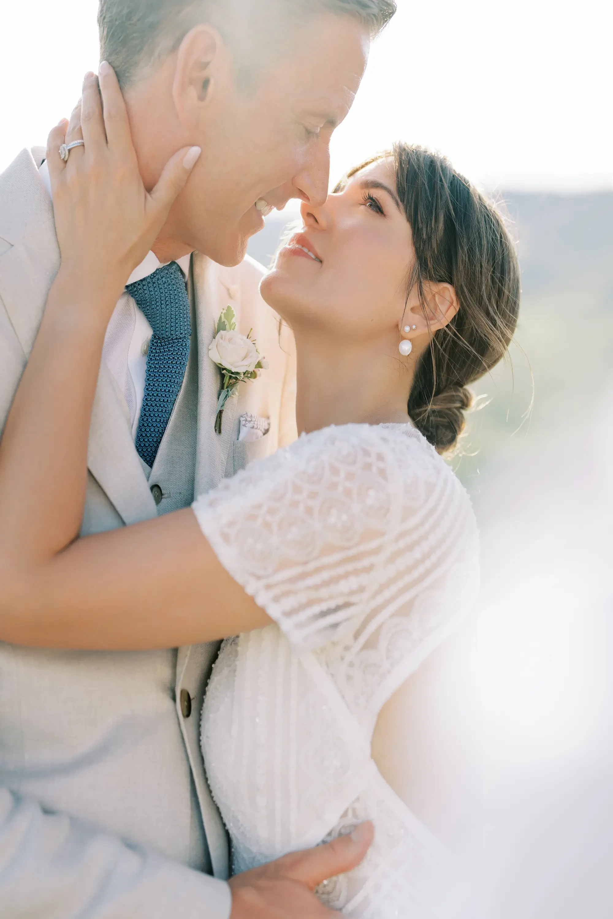 Bride and Groom Close Up Sunlit Portrait
