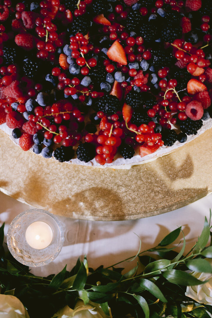 Wedding cake with fresh red fruits