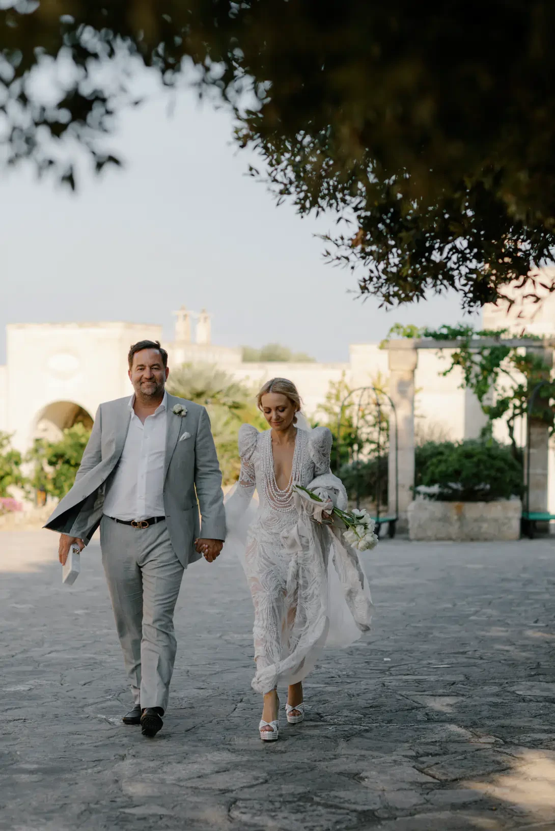 Bridal couple arriving at the reception