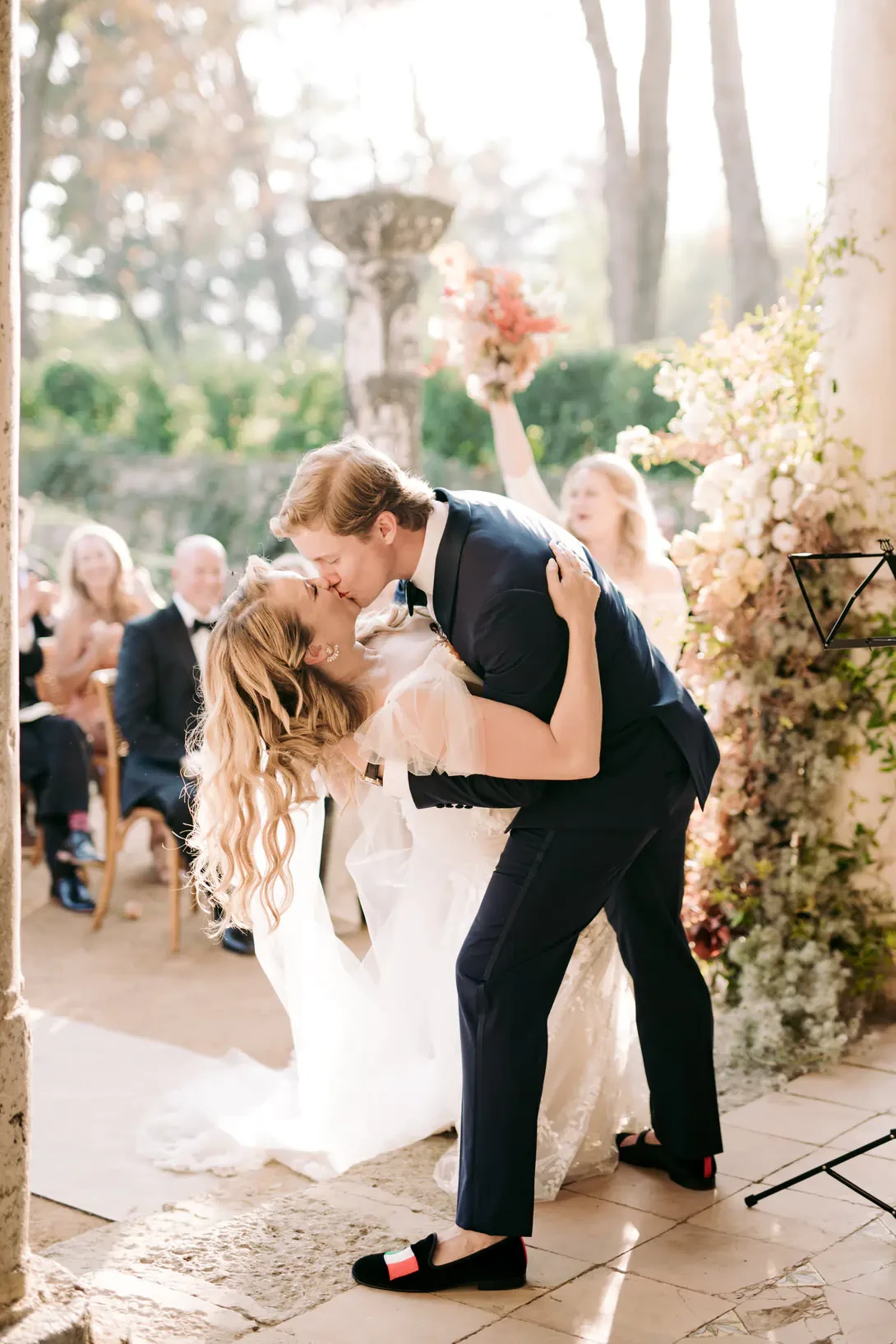 Passionate kiss of the newlyweds