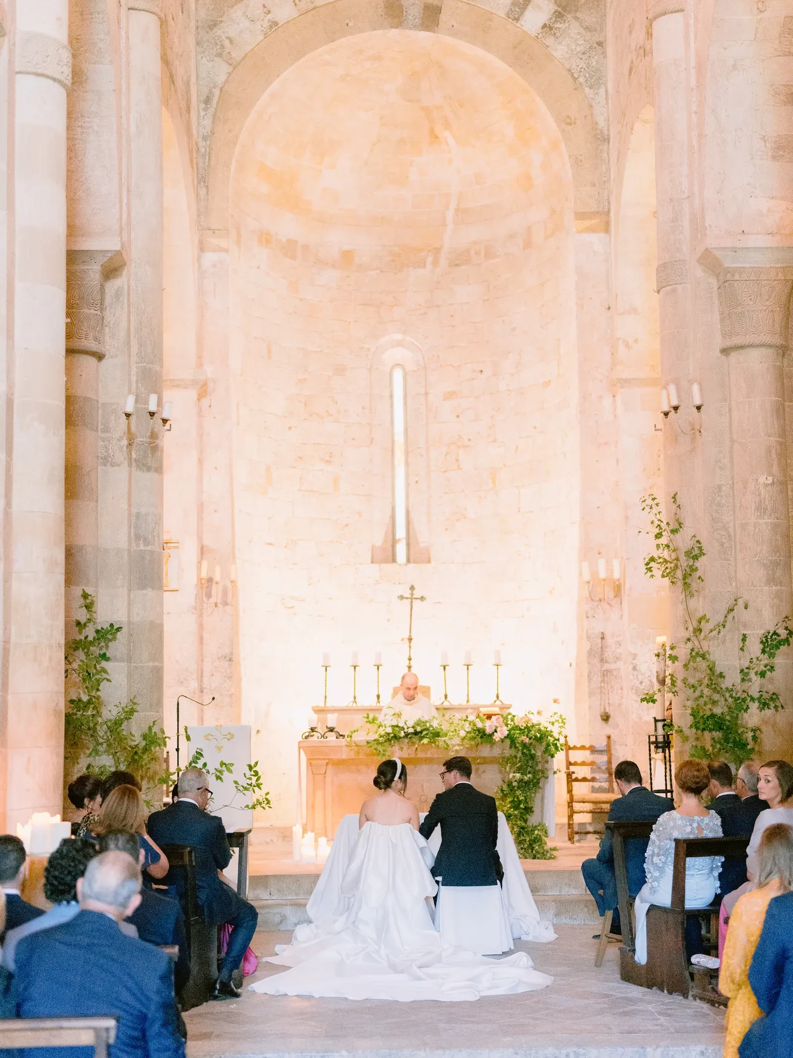 bride and groom during the ceremony in the church