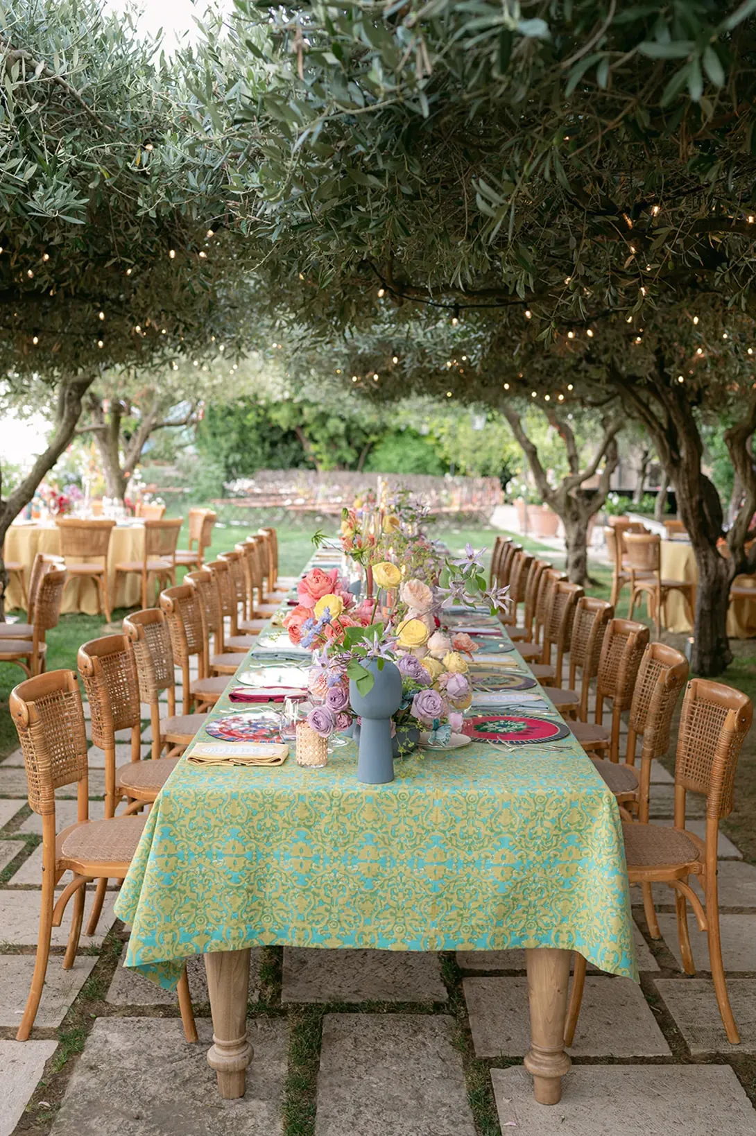 Outdoor wedding receptiontable olive trees