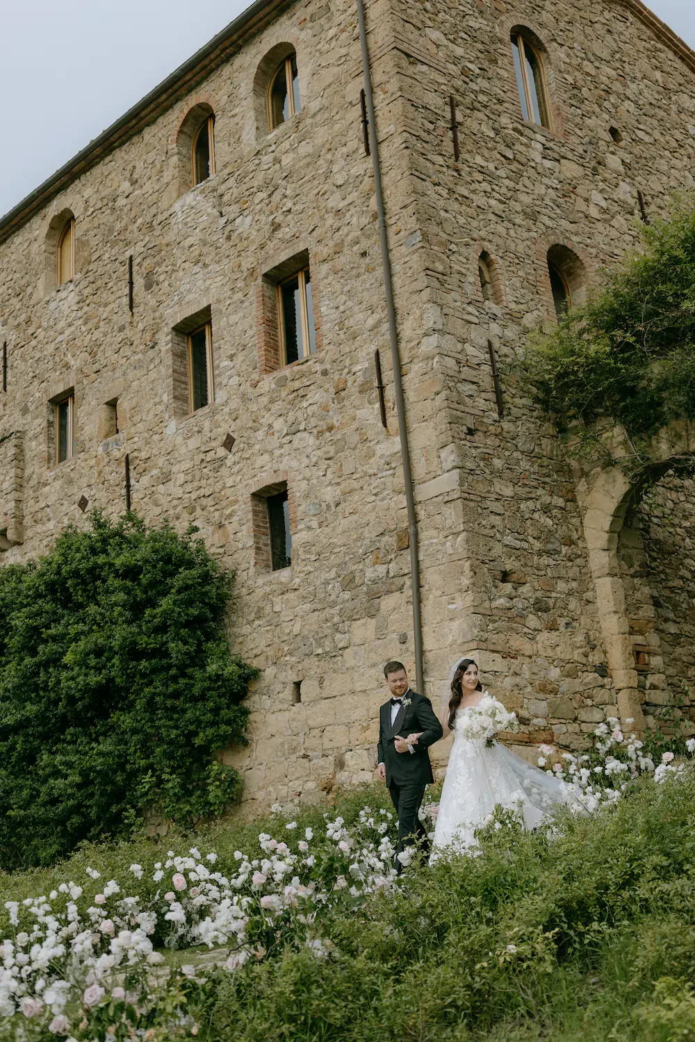 Castello Di Vicarello Tuscany Bride And Groom Stone Facade