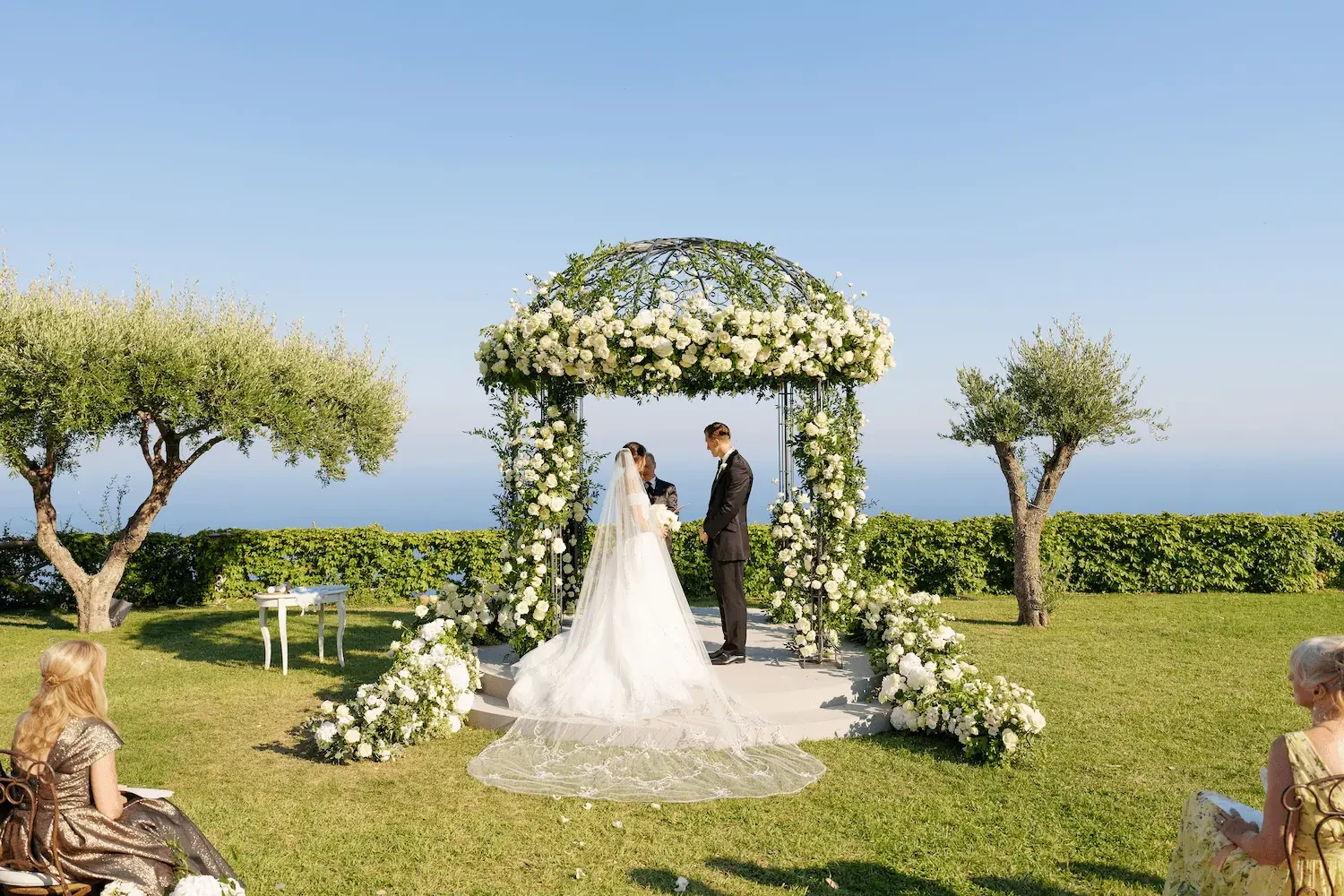wedding ceremony under the flower dome the gardens of Villa Cimbrone