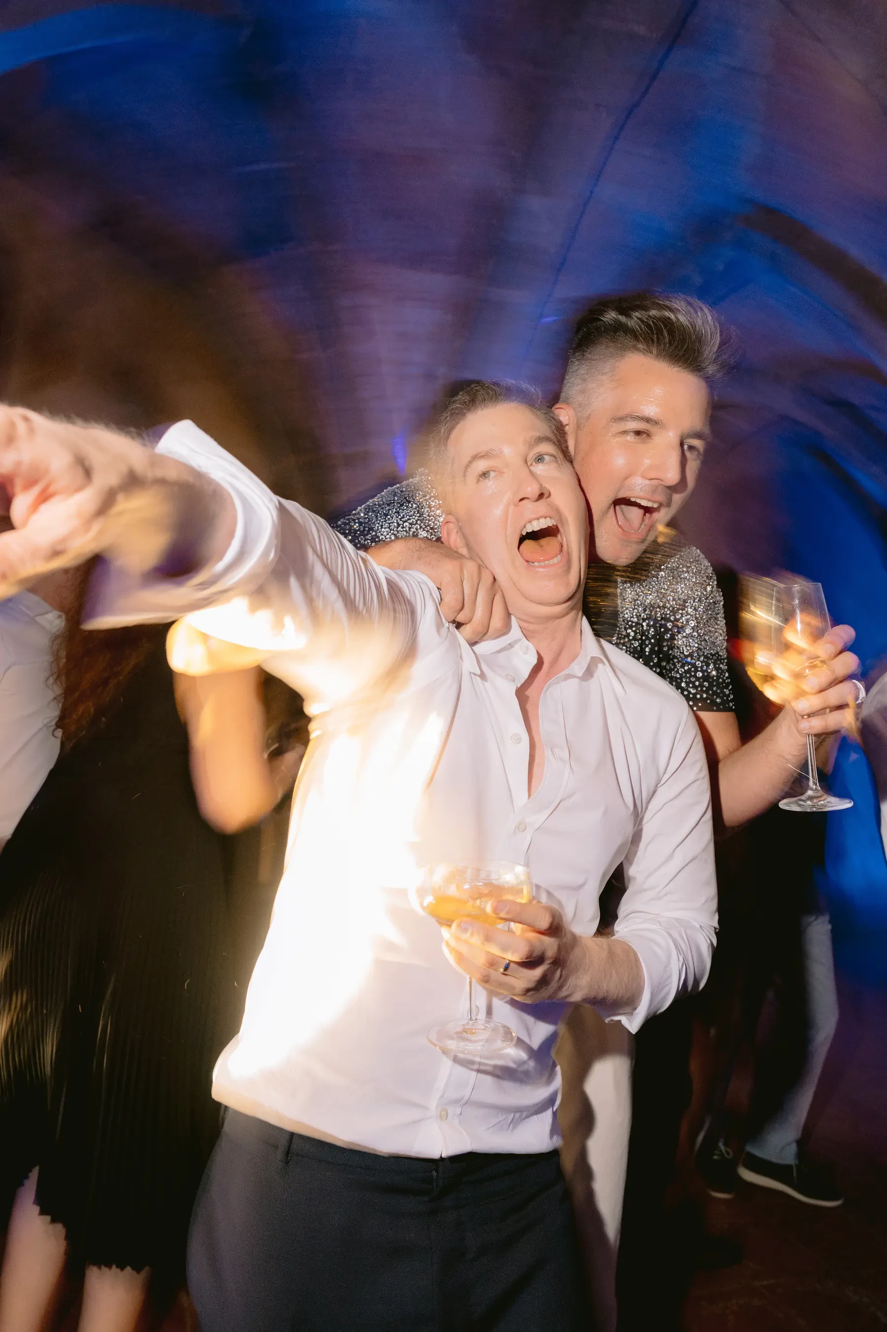 Grooms Celebrating and Dancing Wedding After Party
