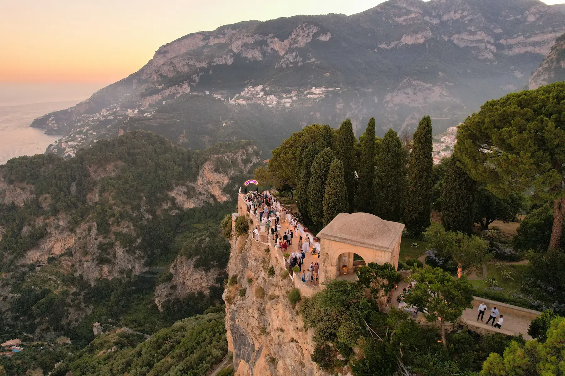 sunset Aereal view of Infinity Terrace cocktail party in Villa Cimbrone in Ravello