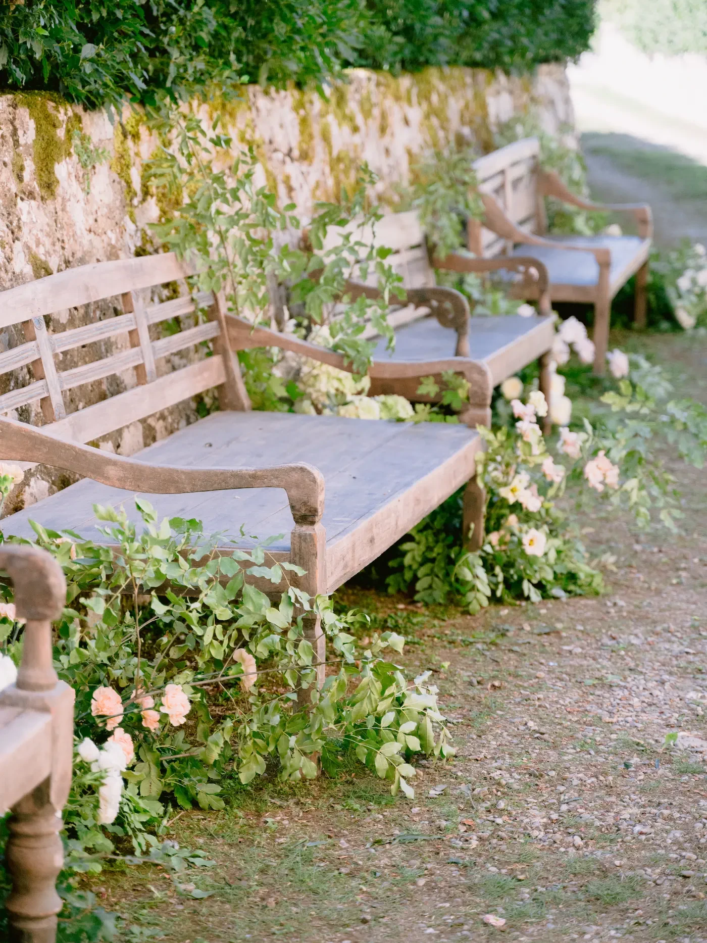 floral decorations on the outside benches of the church