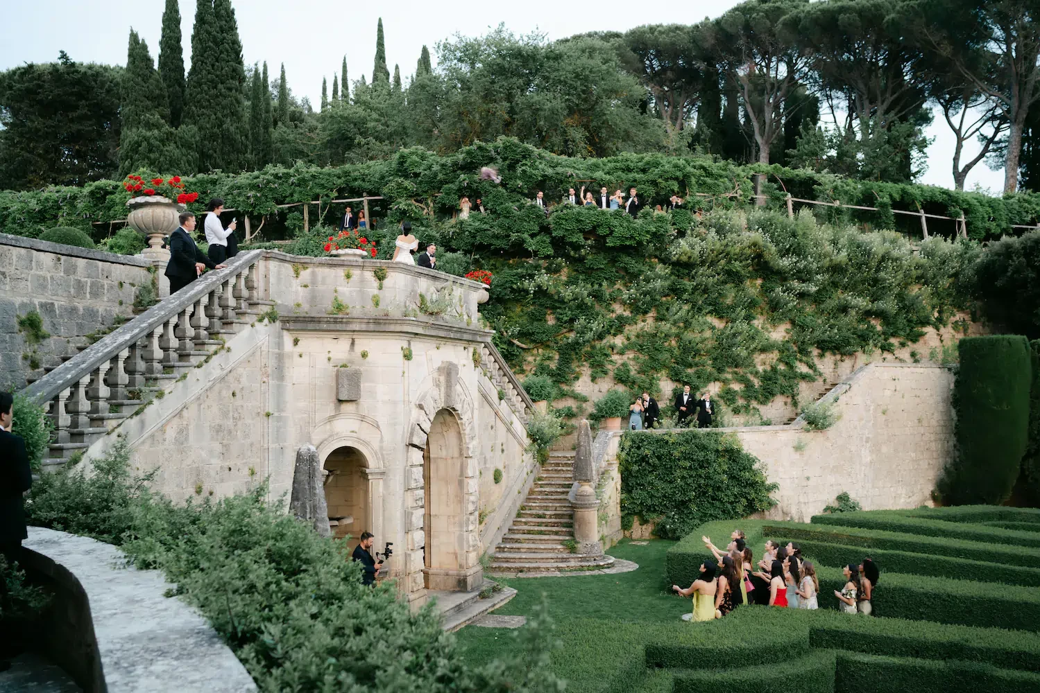 Bride Tossing Bouquet From Terrace Wide Angle Wedding