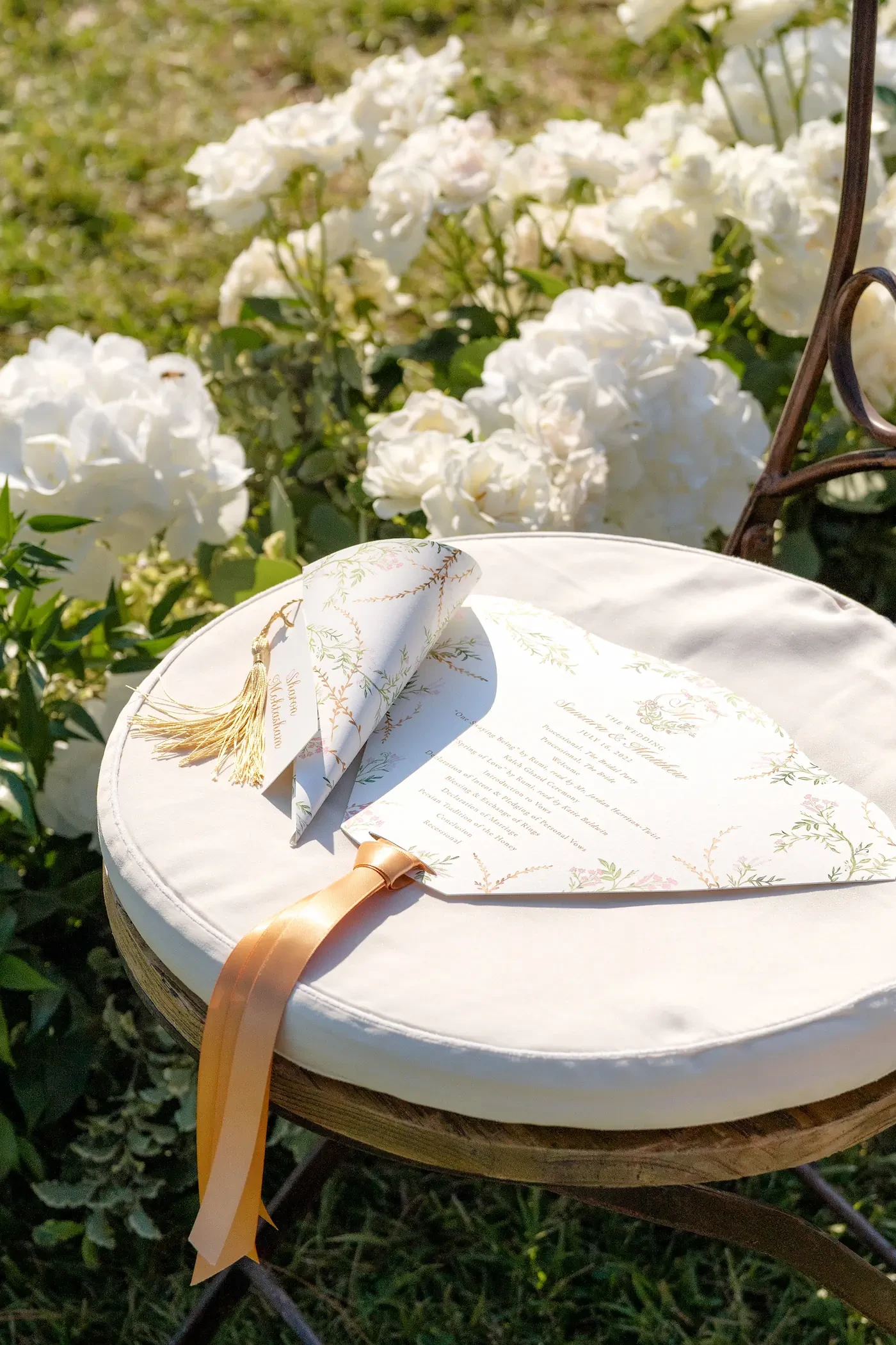 detail of wedding placeholders and folding paper fan in Ravello