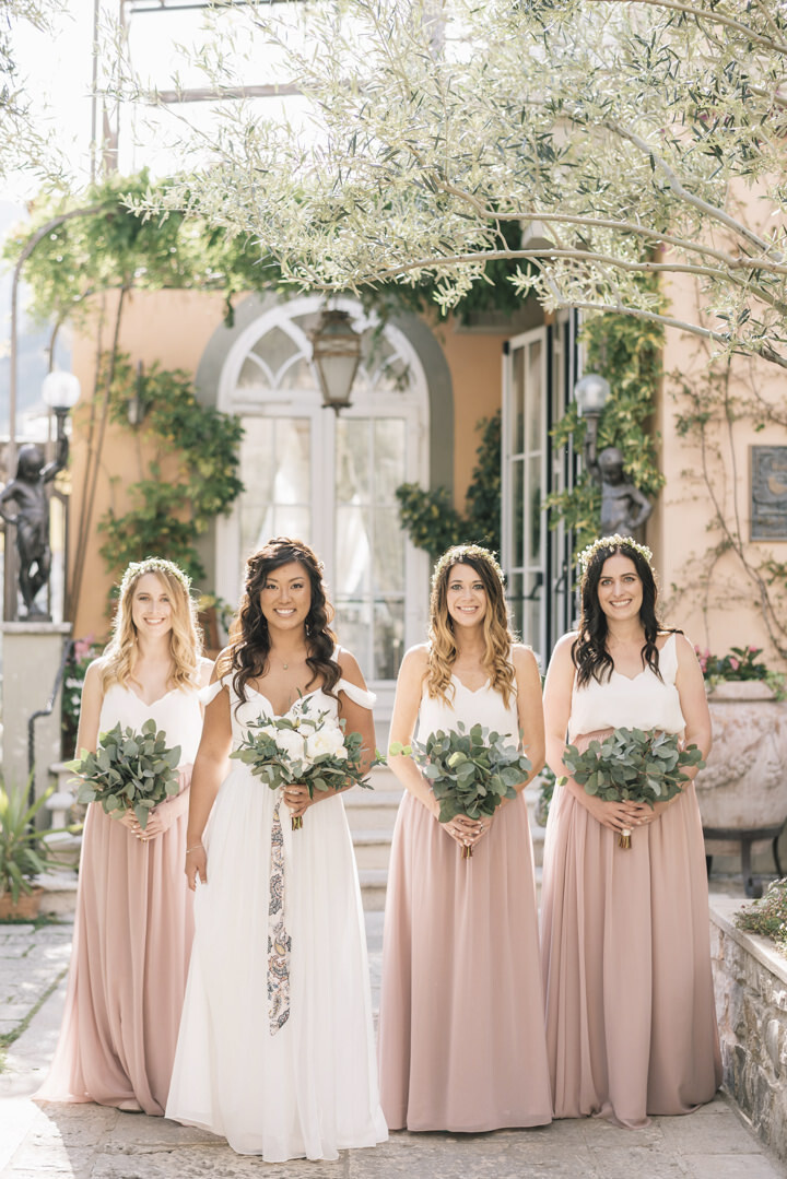 Bride and bridesmaids going to the ceremony