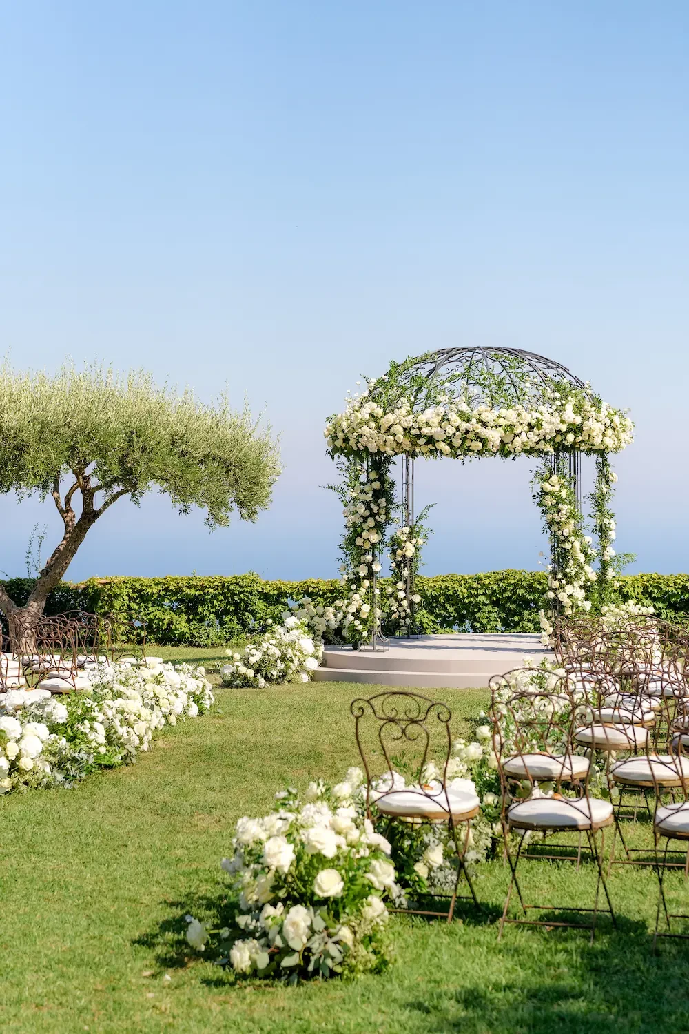 wedding ceremony arch with flower decorations in ravello