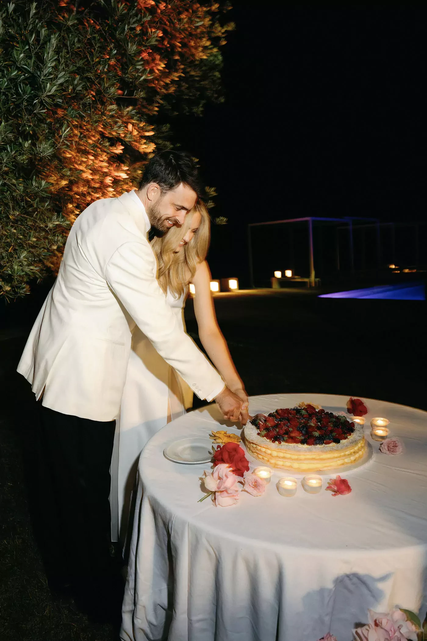 Bride and groom cutting the cake